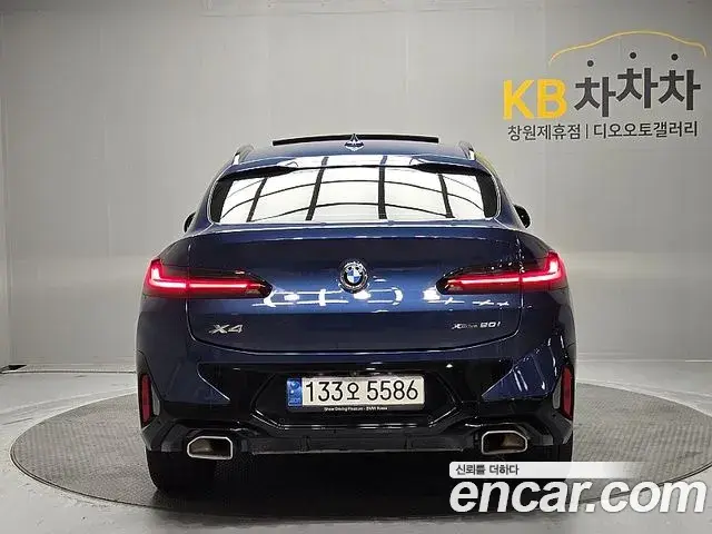 BMW X4 2022 — ფოტო 14/20