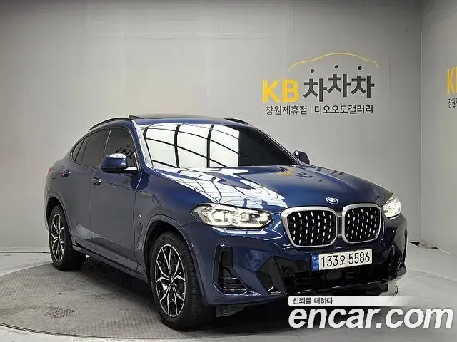 BMW X4 2022 — ფოტო 4/20