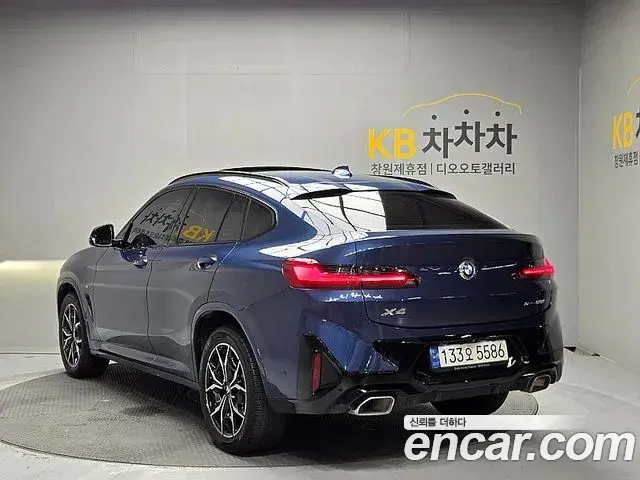 BMW X4 2022 — ფოტო 7/20