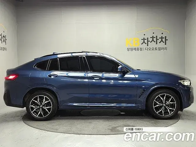 BMW X4 2022 — ფოტო 8/20