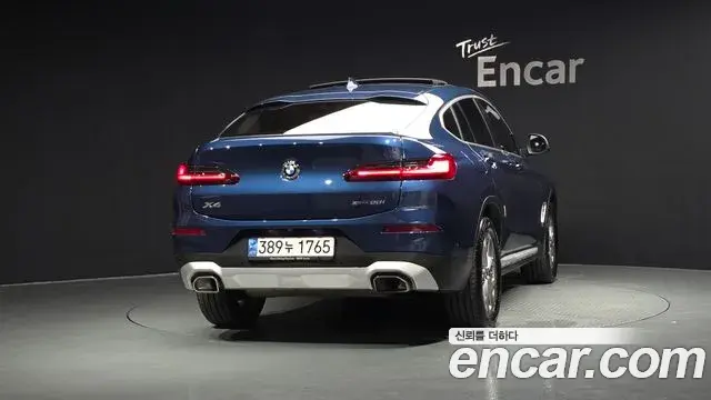 BMW X4 2023 — Фото 4/20