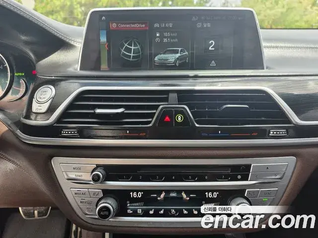 BMW 7 Series 2018 — Фото 12/19