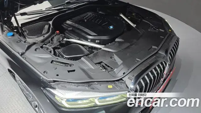 BMW 7 Series 2022 — ფოტო 34/36