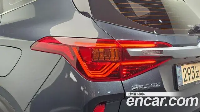 Kia Seltos 2021 — ფოტო 29/32