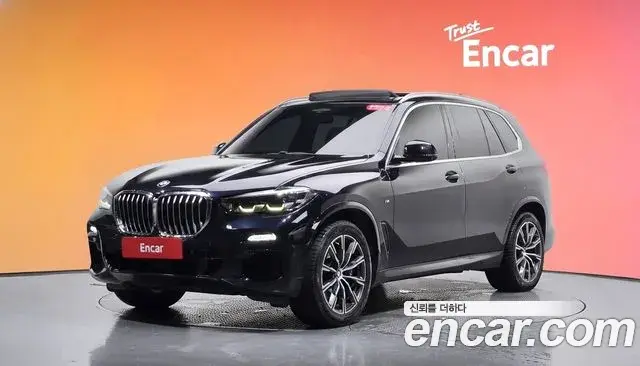 BMW X5 2019 — Фото 1/20