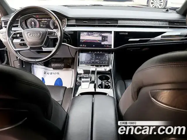Audi A8 2023 — Фото 7/20