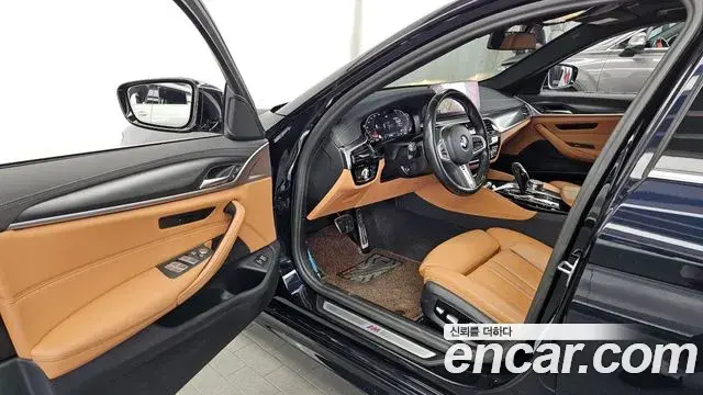 BMW 5 Series 2023 — Фото 10/20