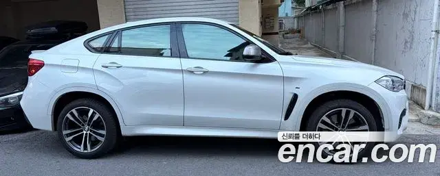 BMW X6 2018 — Фото 1/10