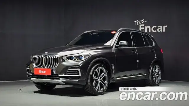 BMW X5 2022 — Фото 1/20