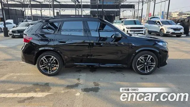 BMW X1 2023 — ფოტო 10/14