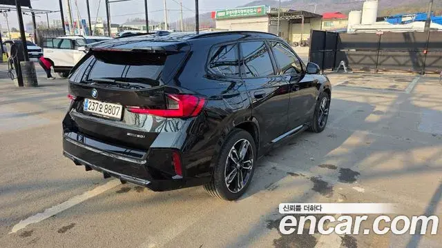 BMW X1 2023 — ფოტო 4/14