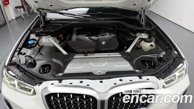 BMW X4 2023 — ფოტო 10/20