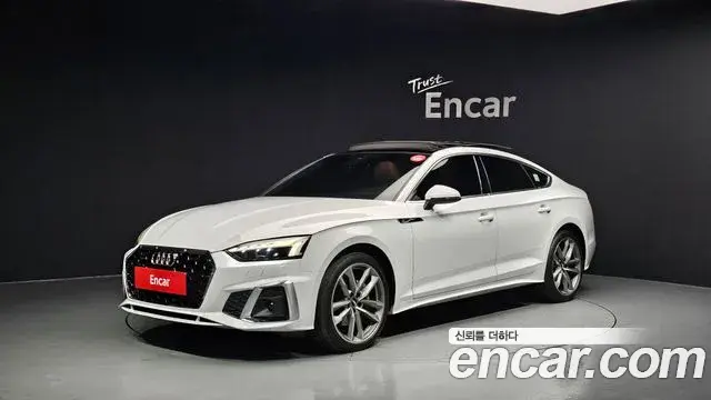 Audi A5 2021 — Фото 1/20