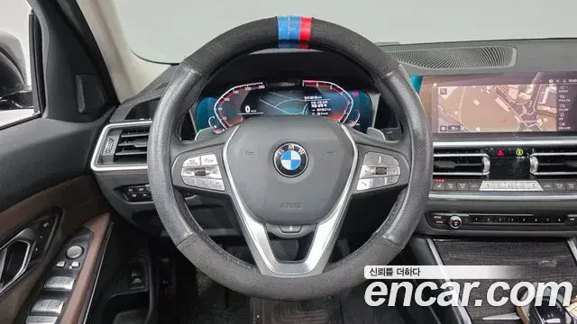 BMW 3 Series 2022 — ფოტო 18/20