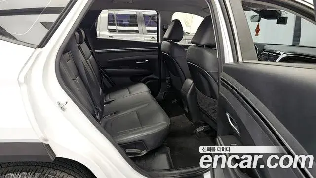 Hyundai Tucson Hybrid 2021 — ფოტო 9/20
