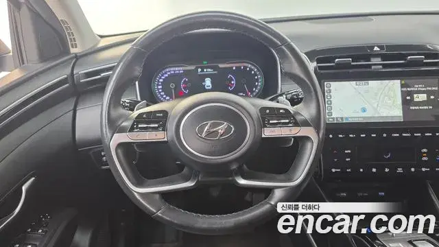 Hyundai Tucson Hybrid 2022 — ფოტო 9/20