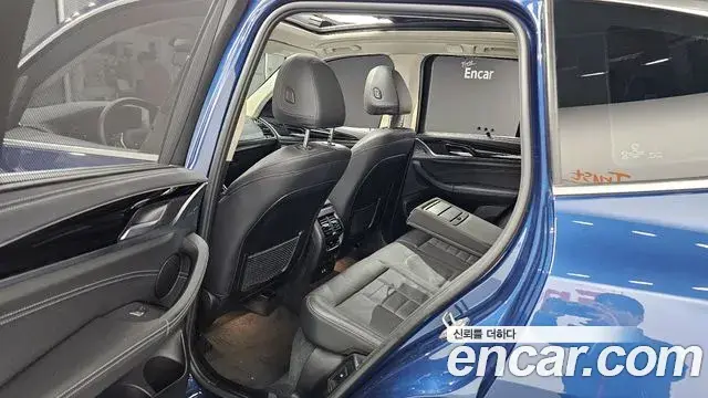 BMW X3 2021 — ფოტო 14/20