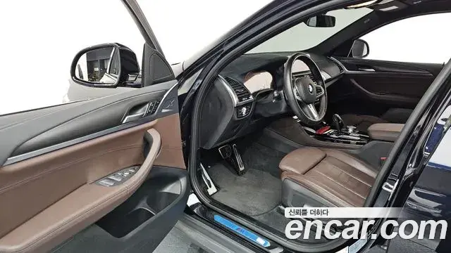 BMW X4 2021 — ფოტო 16/20