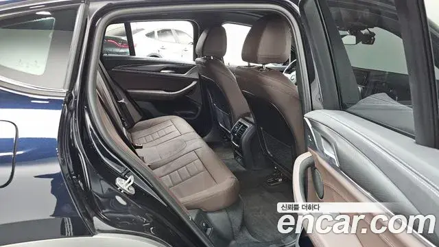 BMW X4 2021 — ფოტო 14/20