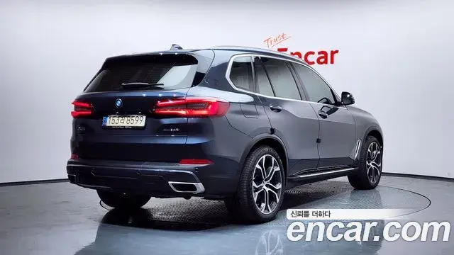 BMW X5 2022 — ფოტო 9/20