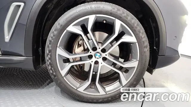 BMW X5 2022 — ფოტო 13/20