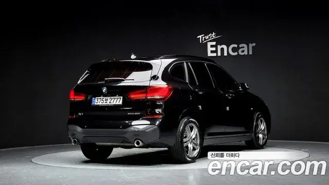 BMW X1 2021 — ფოტო 4/20