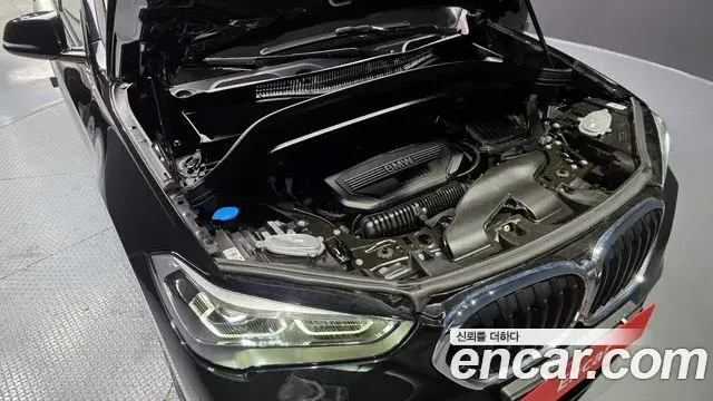 BMW X1 2021 — ფოტო 14/20