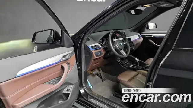BMW X1 2021 — ფოტო 15/20