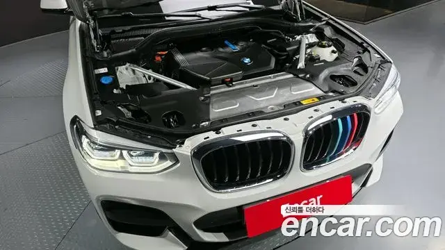 BMW X3 2021 — ფოტო 13/20