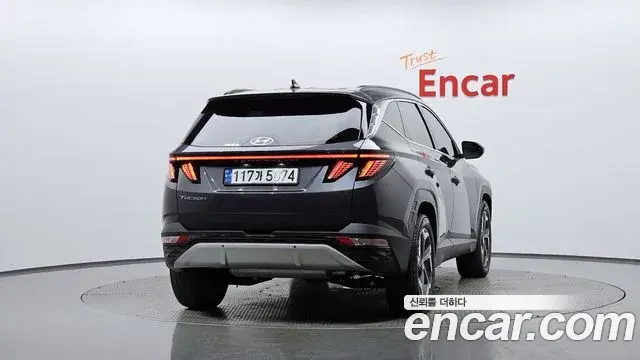 Hyundai Tucson Hybrid 2021 — ფოტო 9/20