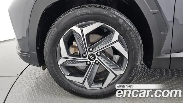 Hyundai Tucson Hybrid 2021 — ფოტო 4/20