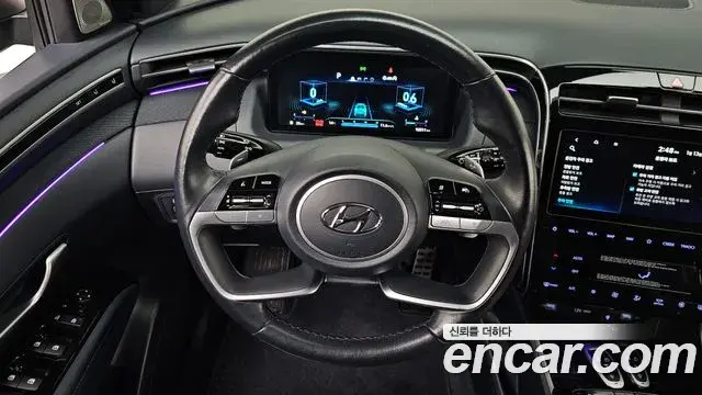 Hyundai Tucson Hybrid 2021 — ფოტო 14/20