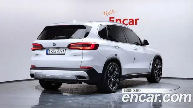 BMW X5 2021 — ფოტო 6/20
