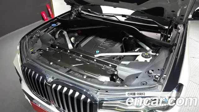 BMW X7 2021 — ფოტო 7/20