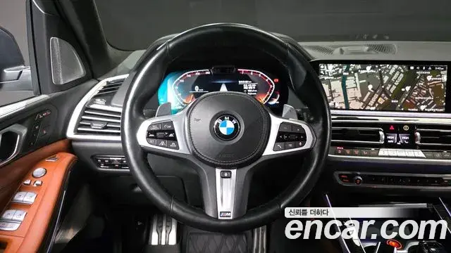 BMW X7 2021 — ფოტო 15/20