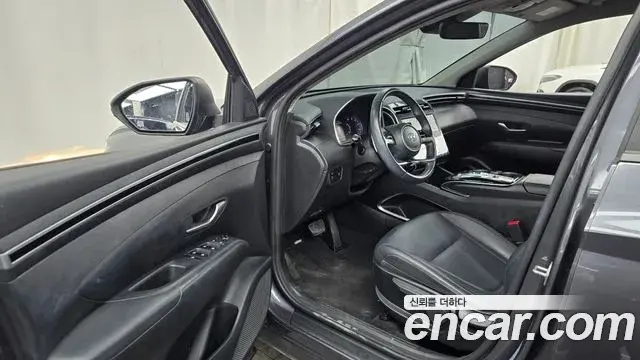 Hyundai Tucson Hybrid 2021 — ფოტო 6/20