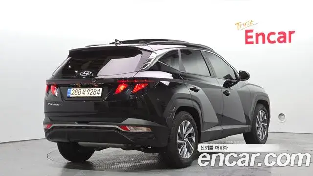 Hyundai Tucson Hybrid 2021 — ფოტო 9/27