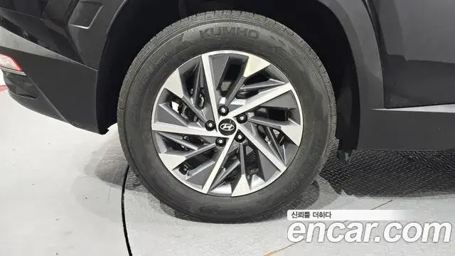 Hyundai Tucson Hybrid 2021 — ფოტო 2/27