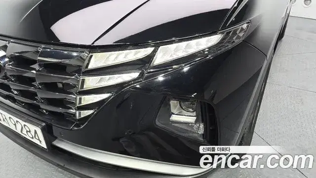 Hyundai Tucson Hybrid 2021 — ფოტო 6/27