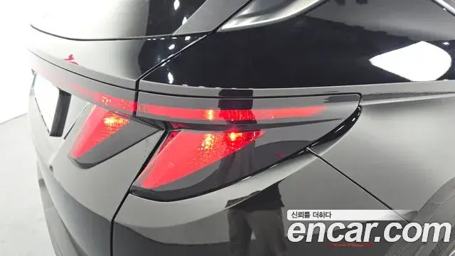 Hyundai Tucson Hybrid 2021 — ფოტო 25/27