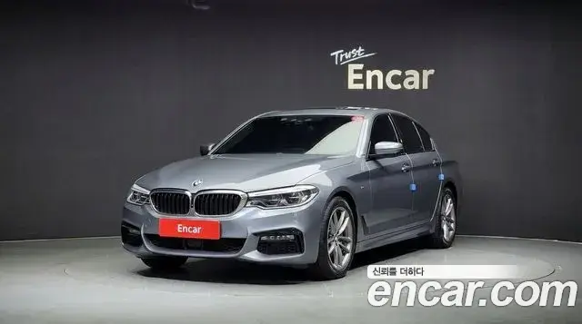 BMW 5 Series 2019 — ფოტო 1/20