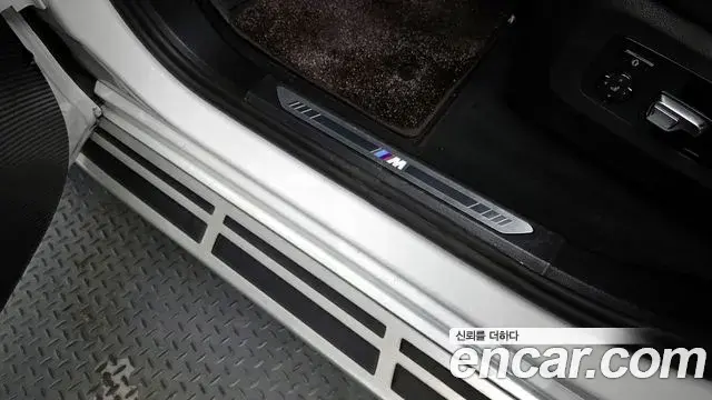 BMW X7 2025 — ფოტო 23/39