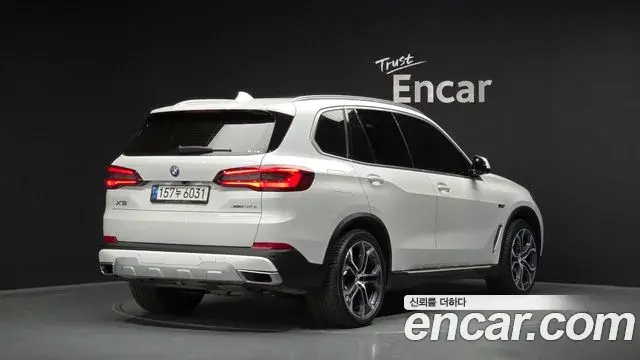BMW X5 2022 — Фото 2/20