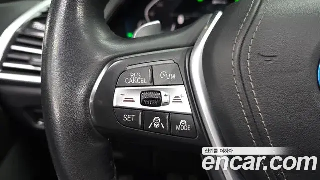 BMW X5 2022 — ფოტო 29/34