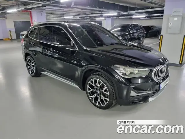 BMW X1 2022 — ფოტო 1/19