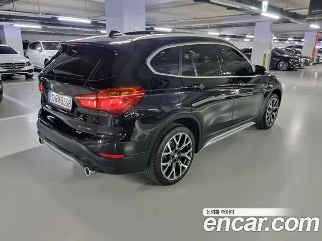 BMW X1 2022 — ფოტო 13/19