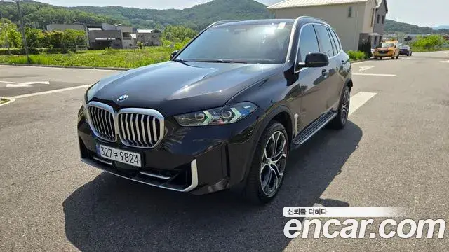 BMW X5 2024 — Photo 2/20