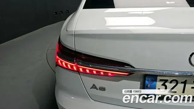 Audi A6 2021 — ფოტო 29/34