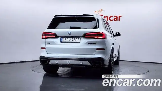 BMW X5 2022 — ფოტო 4/33