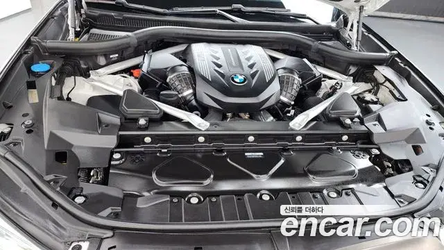 BMW X5 2022 — ფოტო 28/33